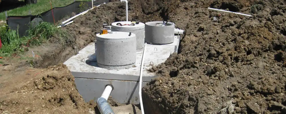 Septic system repair and installation site with tank access ports in Phoenix, AZ