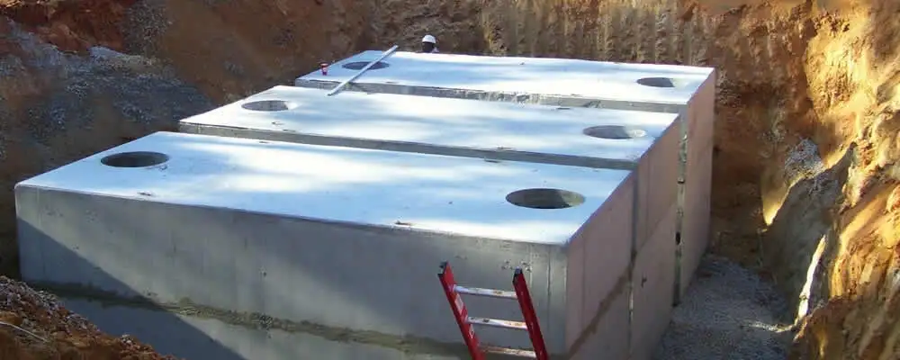 Septic tank installation site with a newly placed concrete tank in Phoenix, AZ